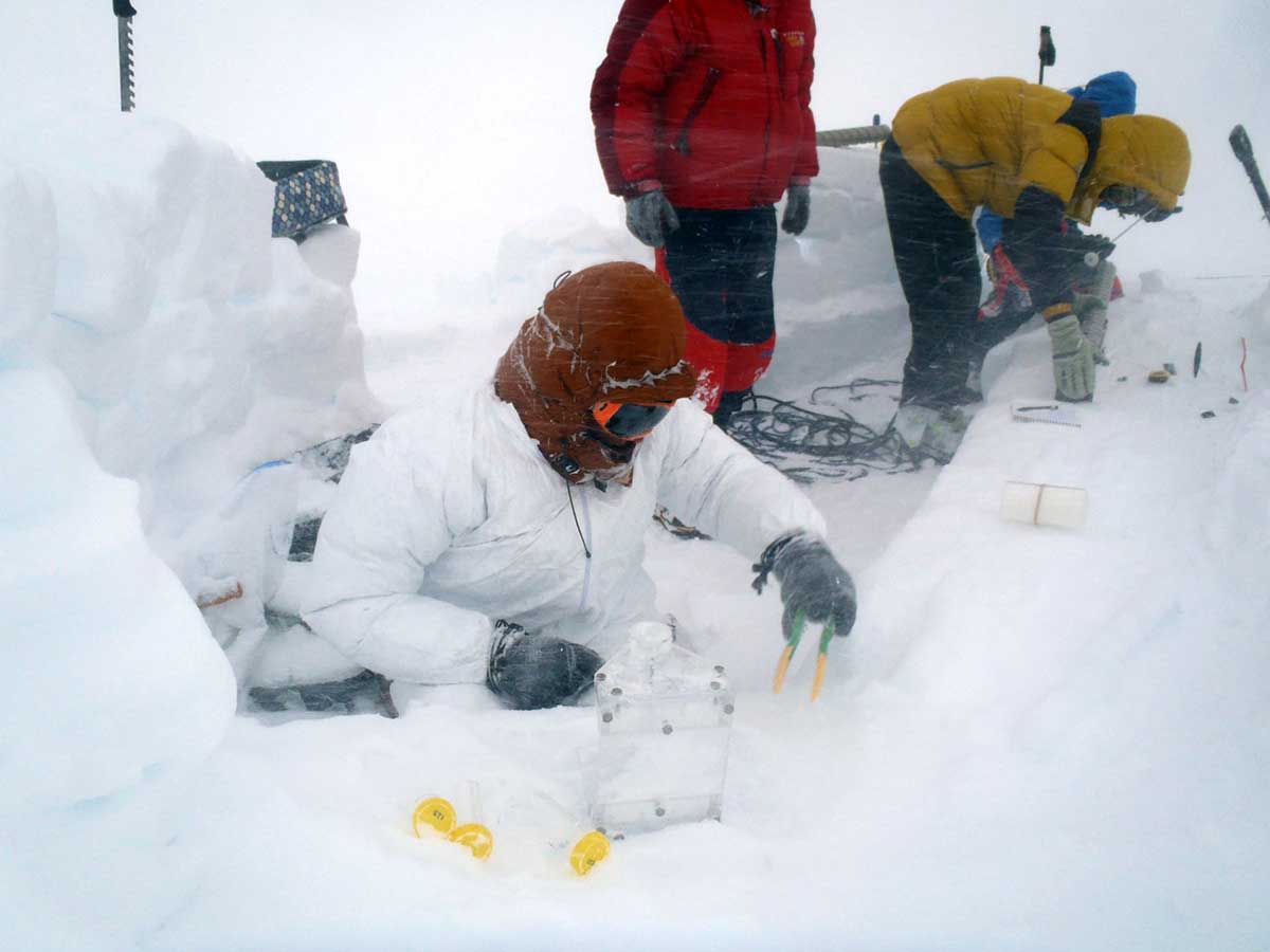 Some of the fieldwork during this science expedition was challenging, such as processing ice core samples in a gale. Photos Westwind Expedition and Skip Novak.